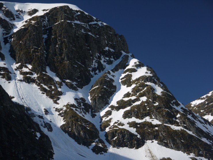 Opening ramps of Staghorn Gully, the Post Face. Coire Ardair. Lone climber just visible low in the shot.