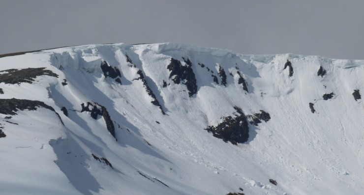 Very large cornices still in situ and weakening in the sustained thaw. 
