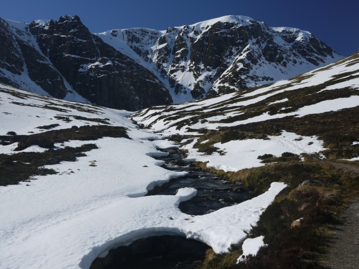 Someone's been having fun trying to collapse a snow bridge over the burn in Coire Ardair.