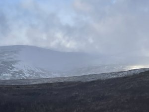 Cooler, with storm conditions in summit areas